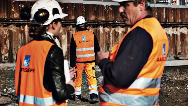 Aarsleff employees onsite at project wearing high viz jackets